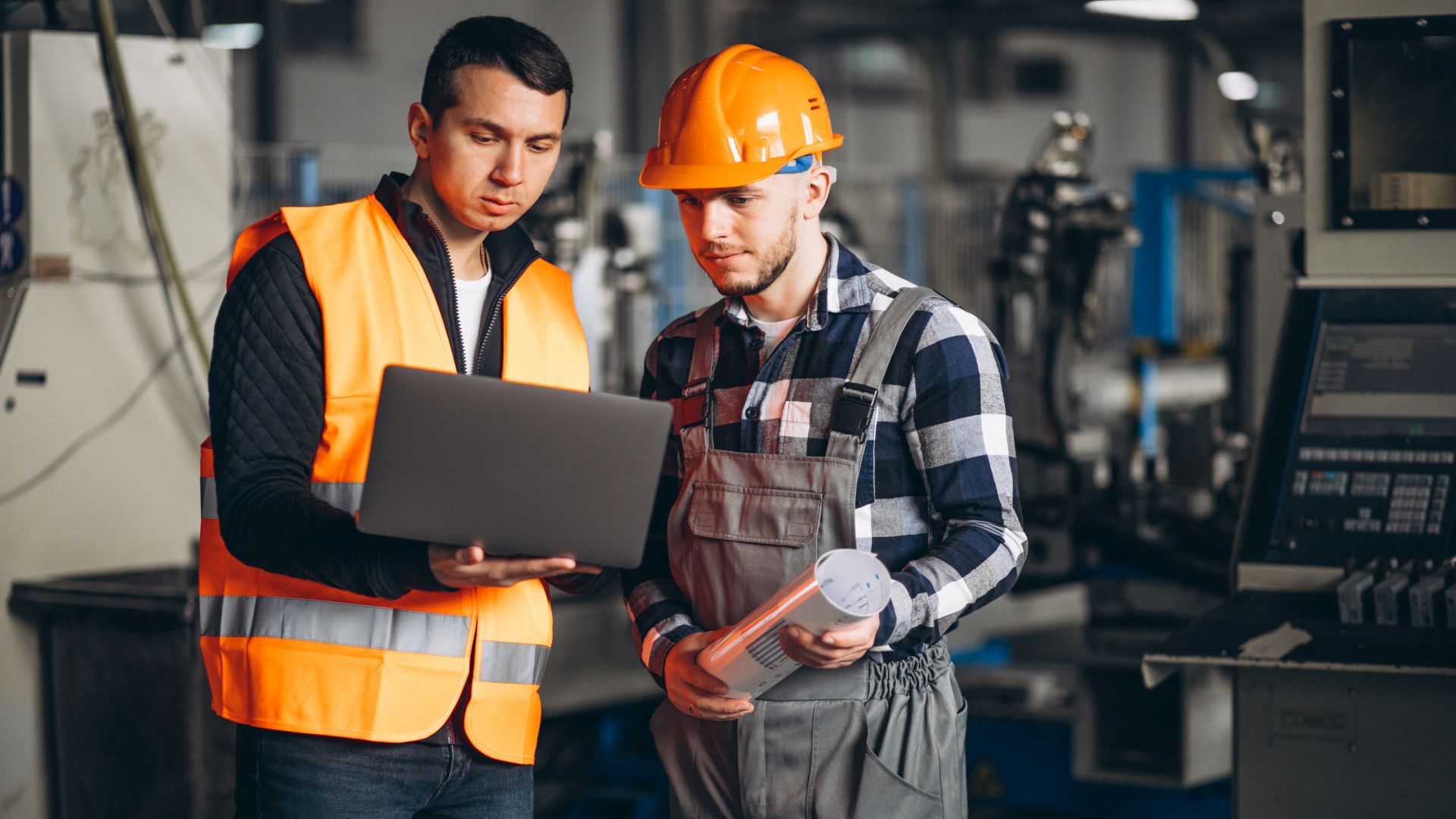 Two colleagues at a factory
